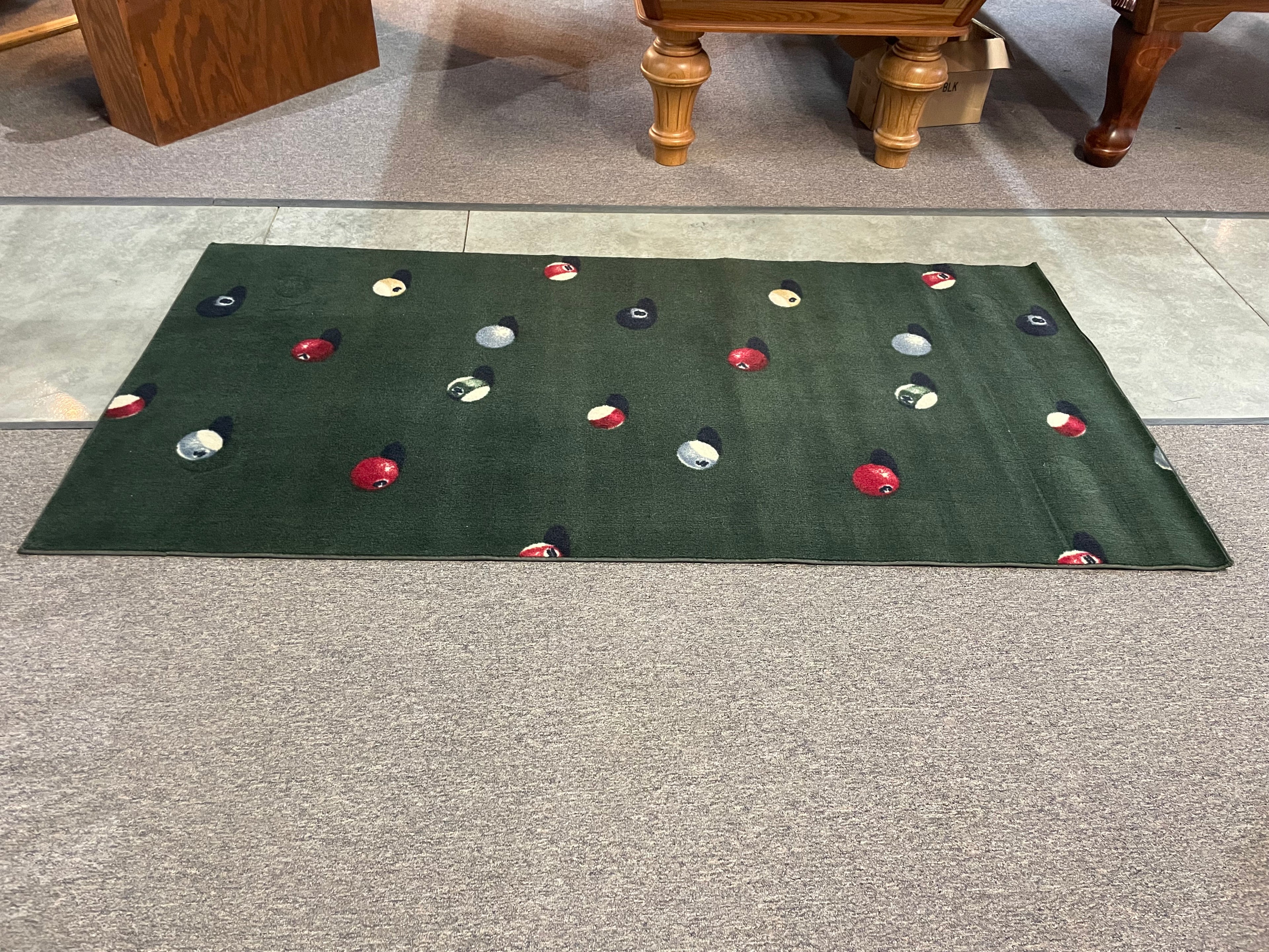 Themed rug for underneath pool table