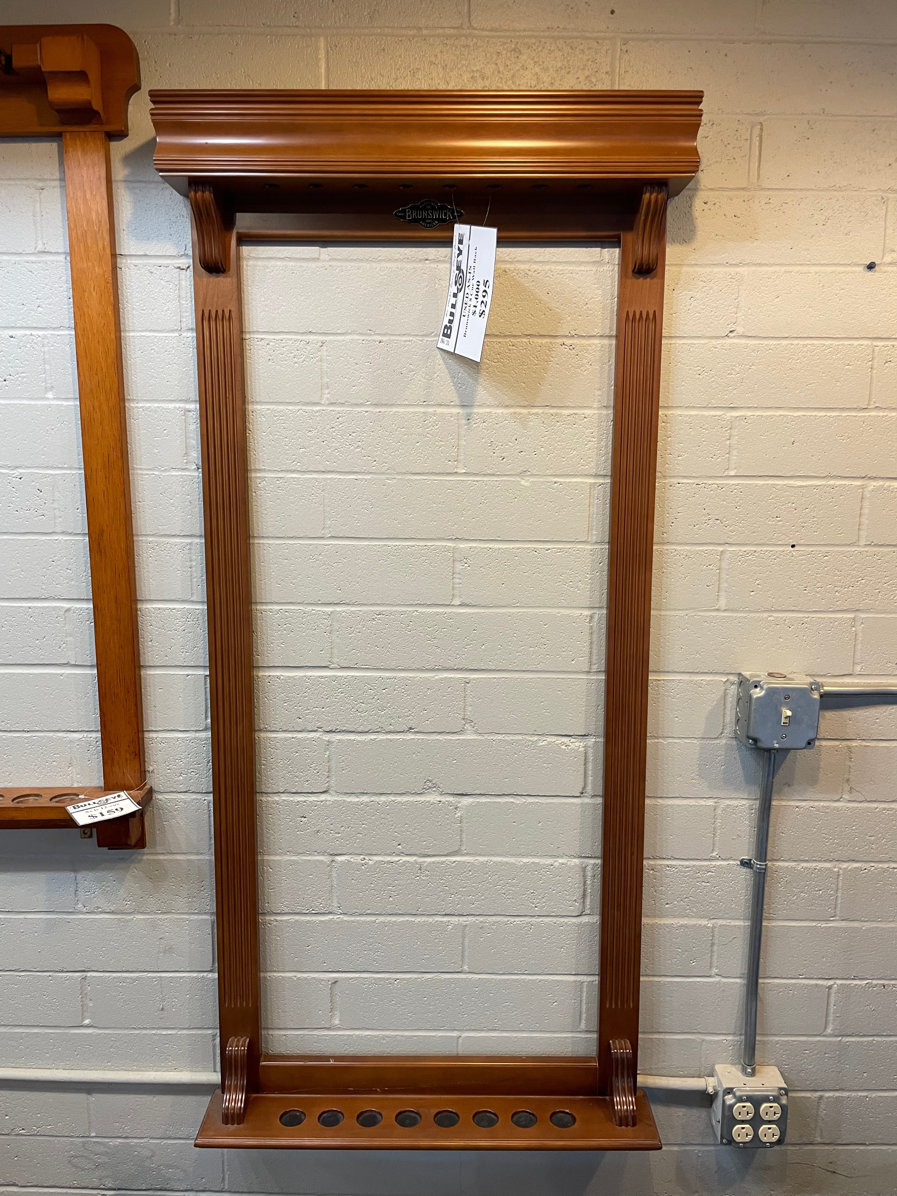 Brunswick 8 cue wall rack