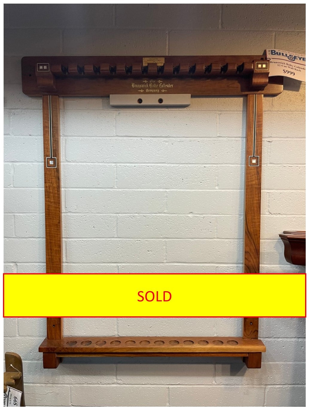 Used Brunswick Balke Collender 12 cue wall rack