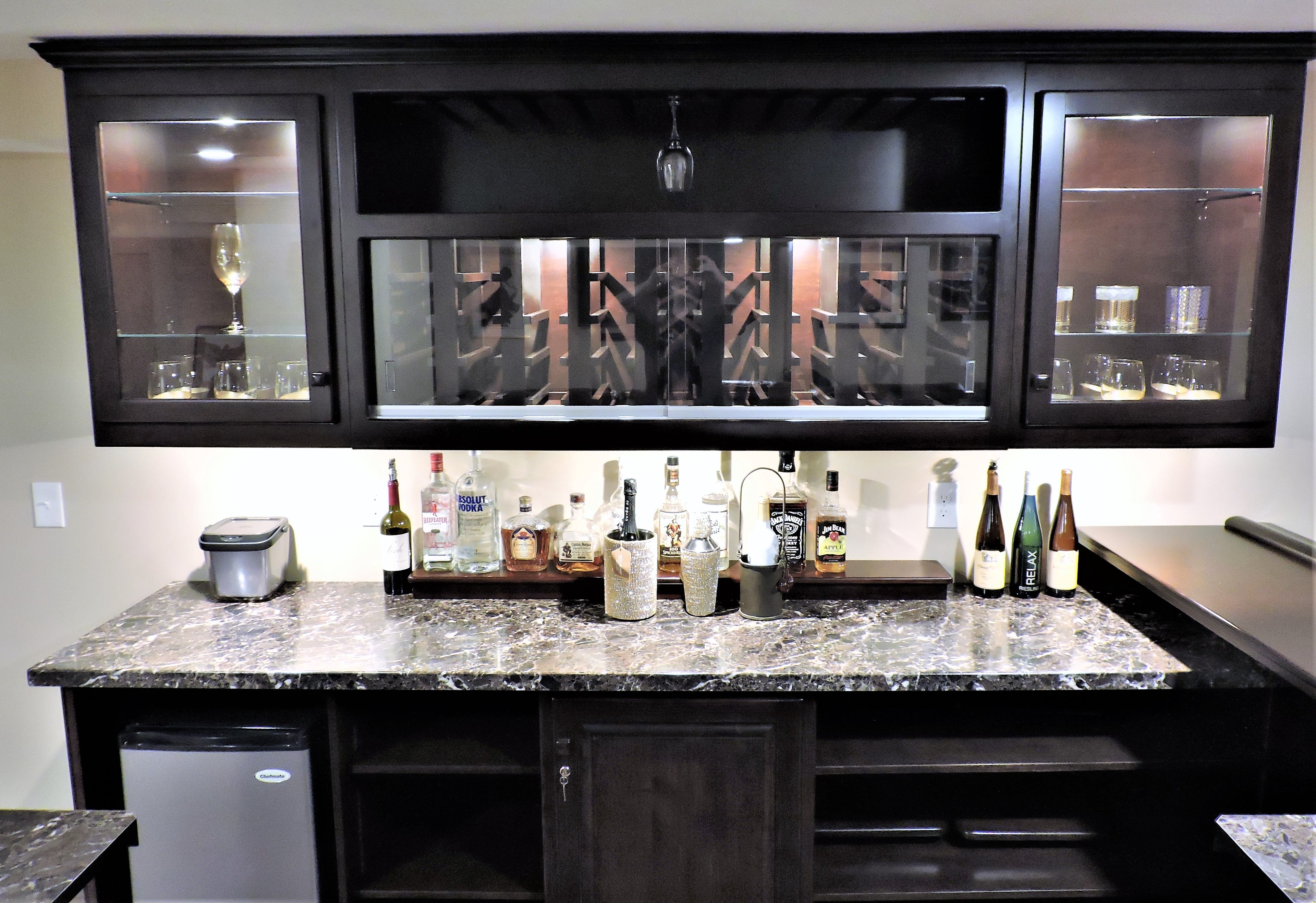 Gorgeous wrap around bar and billiard table.