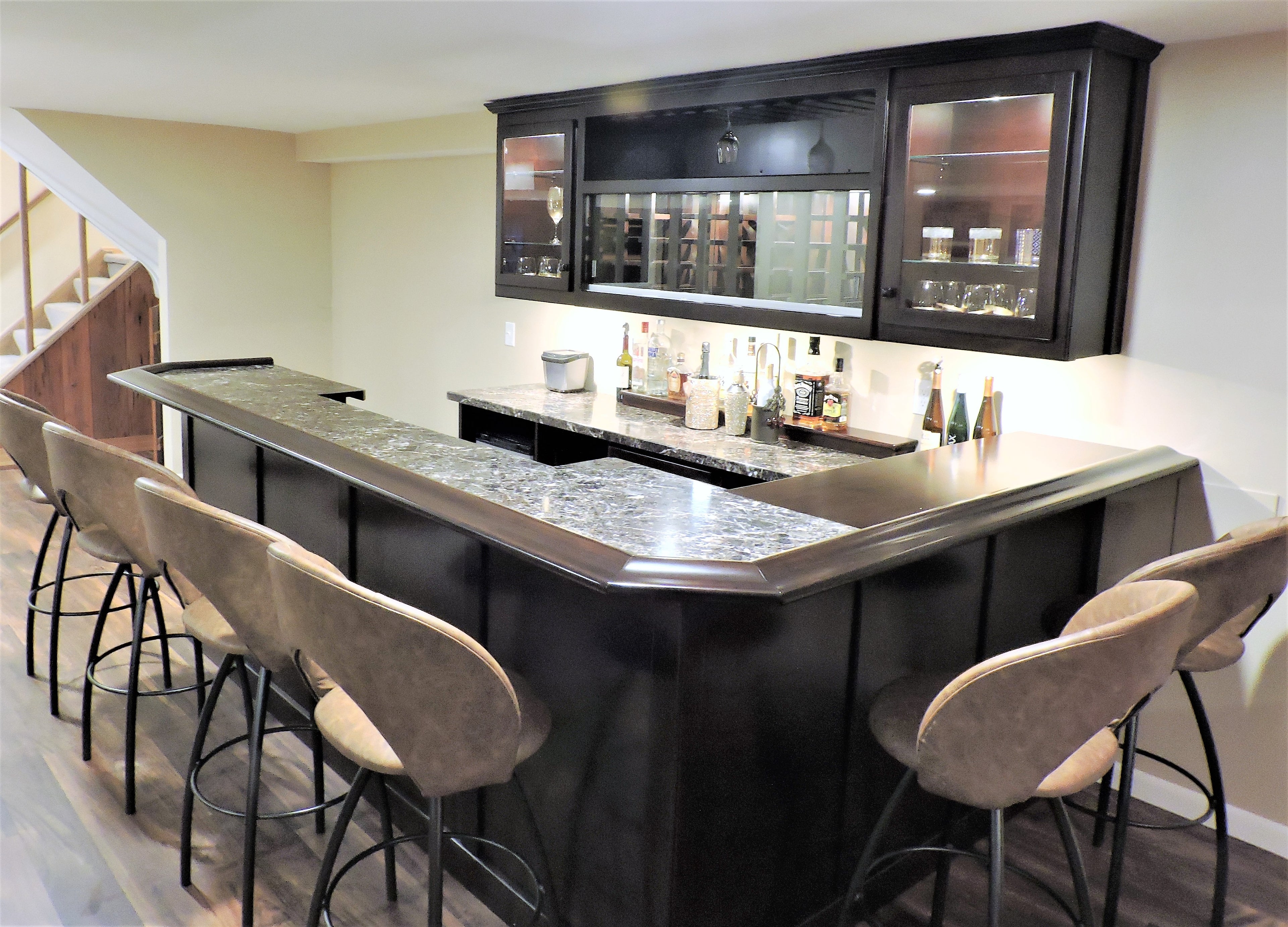 Gorgeous wrap around bar and billiard table.