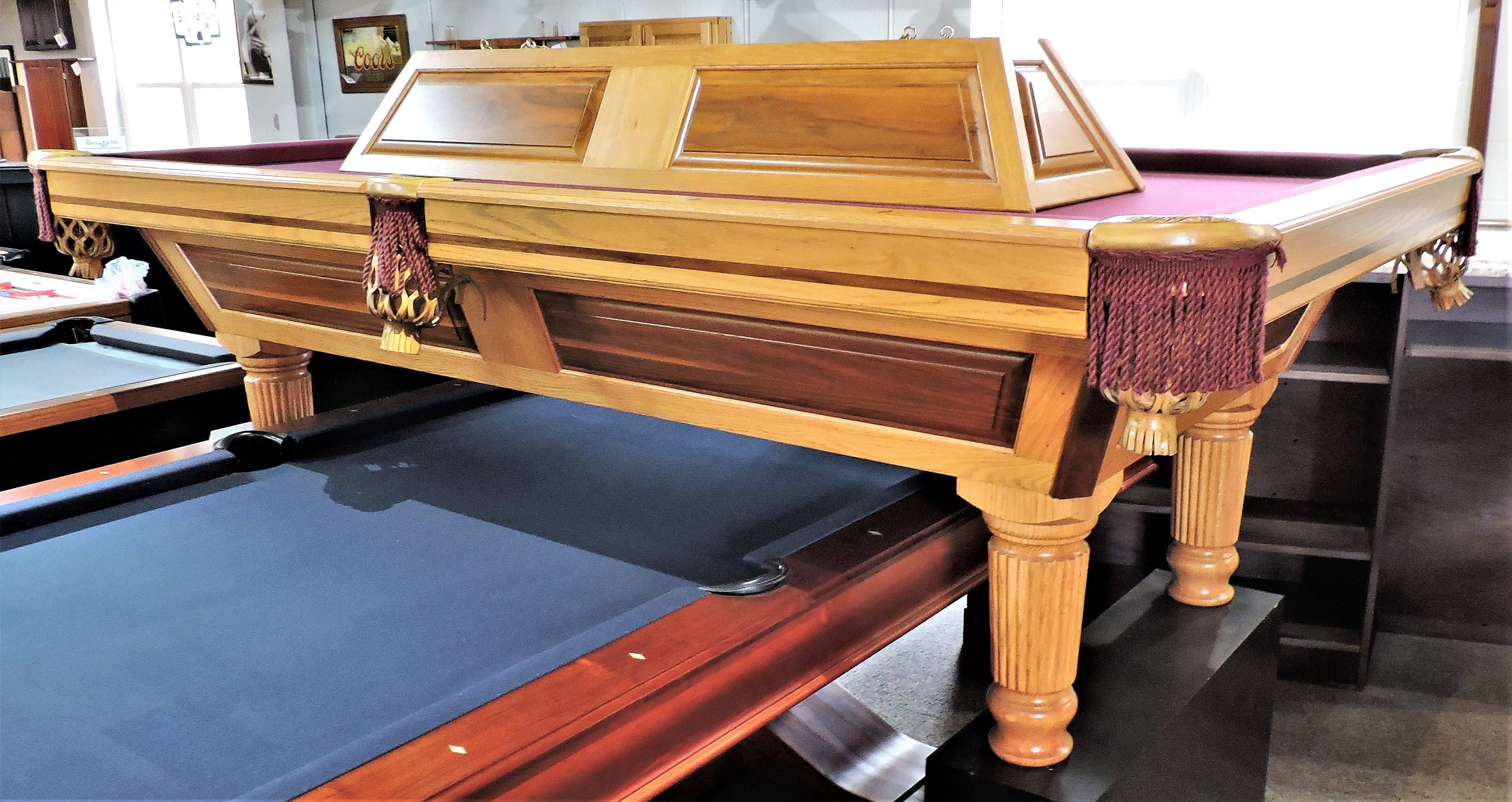 T.C.NAZ Raised panel walnut and red oak pool table and light combo showroom special